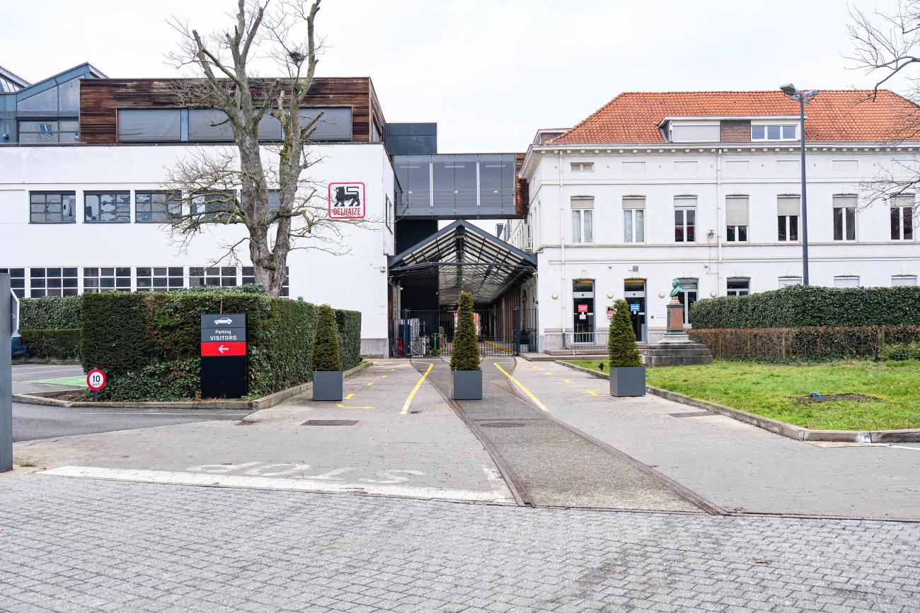 two buildings with hanging tube between them